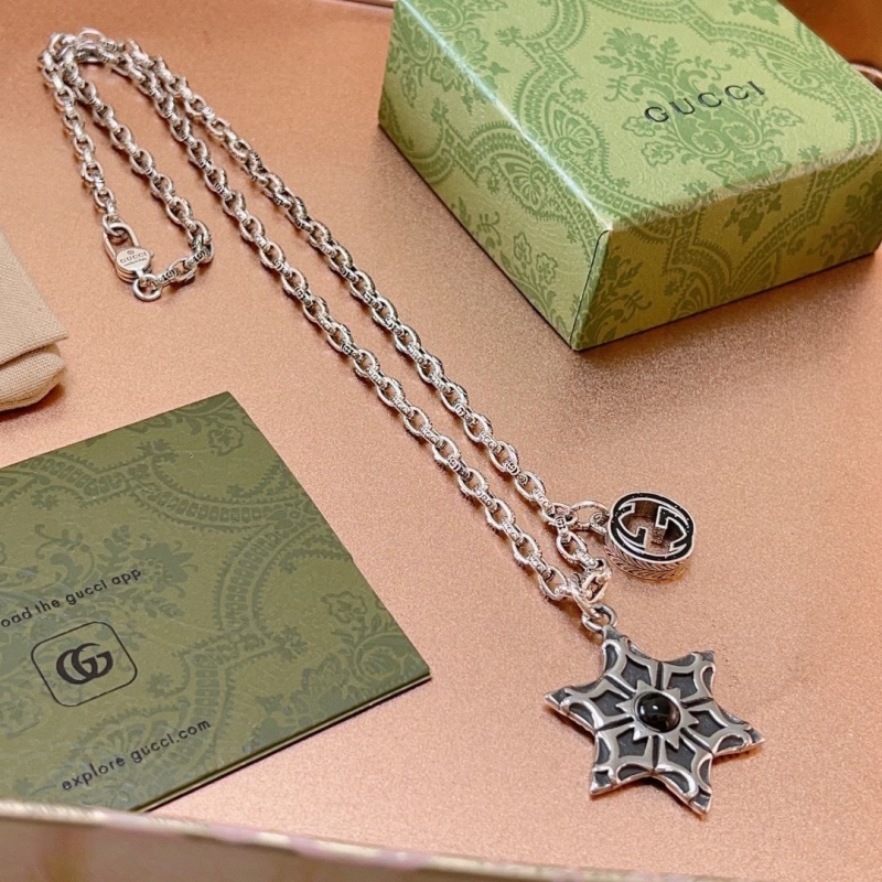 G*u*i necklaces